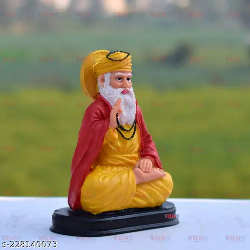 Delicate, graceful Guru Nanak Ji idol from India, finely crafted with beaded details and calm expression