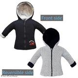 Cotton reversible animals print baby jacket (0-6M, 2-3Y, 3-4Y). Comfortable, machine washable, easy care for various occasions. Printed side features cultural flair, solid side offers versatile style