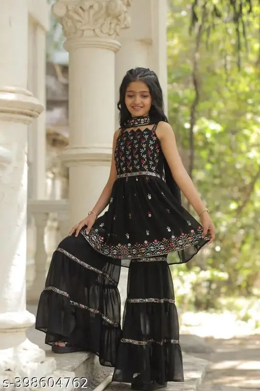 Black embroidered Georgette sharara set with matching dupatta, suitable for special occasions. 3-4 years: top length 20 inches; 4-5 years: top length 20 inches; 5-6 years: top length 22 inches; and so on up to 14-15 years. Handcrafted in India