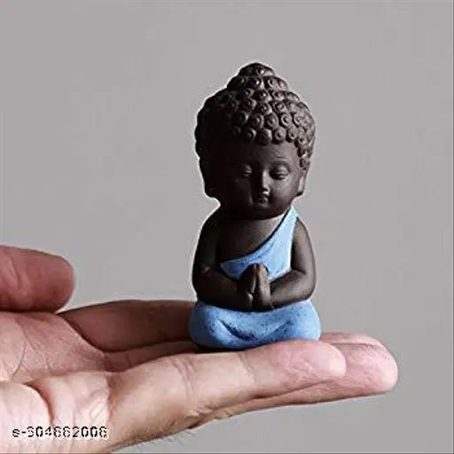 Blue resin baby Buddha statue, intricately detailed antique design by Indian artists, measures 10 cm x 10 cm x 10 cm (LWH), fragile item