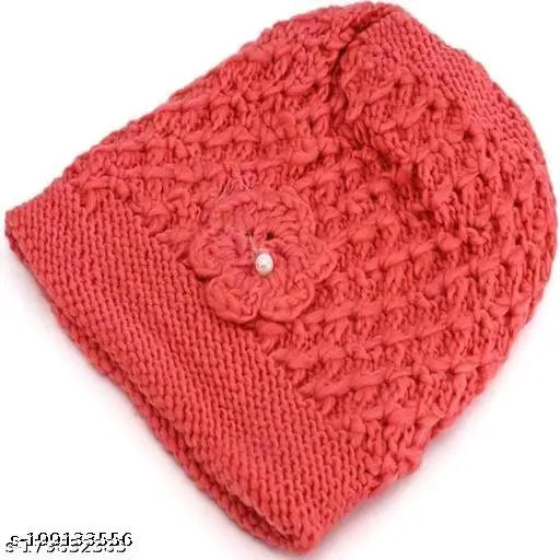 Red woolen fur unisex winter beanie with Madam Flower design, suitable for various weather conditions, Indian origin