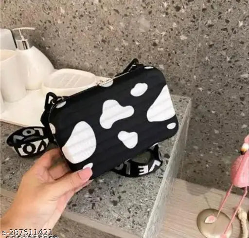 Navy blue synthetic animal net sling bag with detachable belt, features 2 compartments, ideal for travel accessories