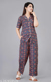Multicolor rayon women's floral print night suit with three-quarter sleeves, India-made loungewear set on display