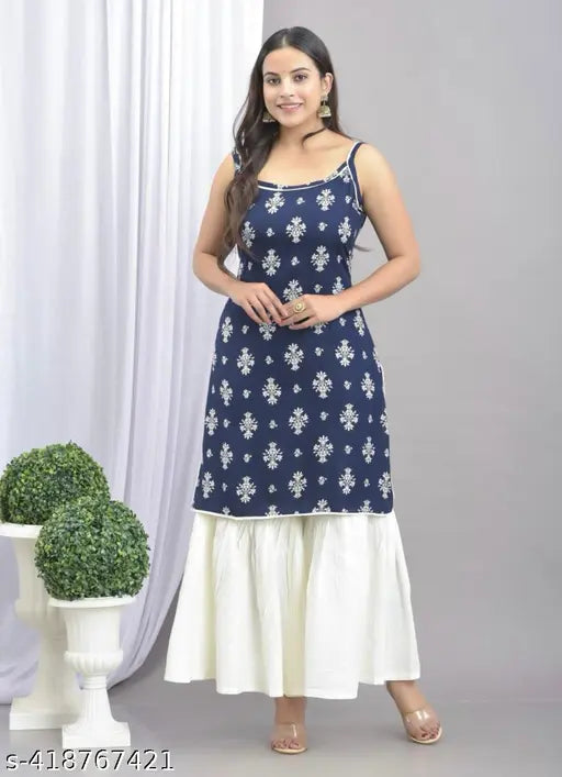 Printed net cotton sharara set with palazzos, sleeveless, available in S-XXL. Indian fashionable Kurta and bottomwear on display