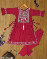 Rayon Nira maroon embroidered kurta pajama set for kids, three-quarter sleeves with computer embroidery on display