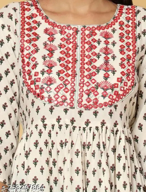 Cream viscose rayon gown with floral print, three-quarter sleeves. Heavy border embroidery gown from India." (108 characters)