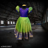 Graceful Girls ethnic gowns, maxi full length Anarkali dress in checked net and jequard silk with zari butti and banarasi. Round neck, half sleeve design. Dry clean only. Indian occasion wear for ages 12 months - 10 years." (122 characters)