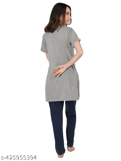 Embroidered cotton blend summer night suit set for women, featuring printed design, short sleeves, and pyjama pockets with side slits. Comfortable, easy wash, and soft poly-cotton fabric. Duchess set perfect for active or casual wear. Made in India