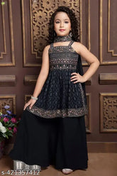 Black multi-color embroidery and sequins work peplum top and palazzo set for girls. Georgette fabric with dupatta. A-line shaped top, palazzo bottoms. Sizes available from 3-4 years to 15-16 years. Origin: India