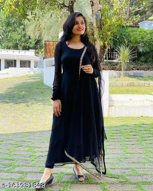 Black georgette gown with dupatta set, solid design Indian bridal wear for women's formal event on mannequin