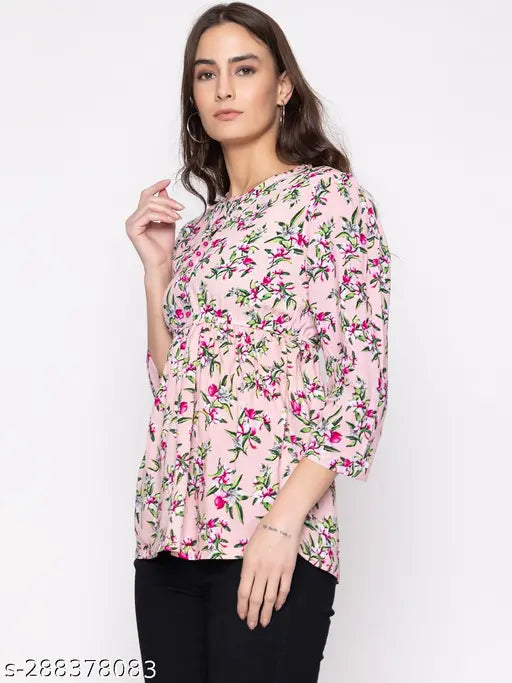 Printed cotton blend women's three-quarter sleeve top, vibrant pattern on soft fabric, fashionable choice for casual wear (India)