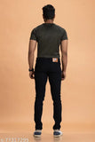 Solid black denim jeans for men, durable and stretchable with comfortable pockets. Perfect for casual, party, or office wear. Available in sizes 28-42 (waist 28-42, length 42, hip 28-42). India origin