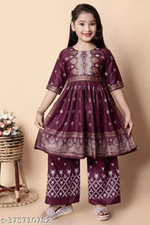 Maroon rayon Naira cut Kurta and Palazzo set for girls, three-quarter sleeve printed net pattern by Rahul Mullick