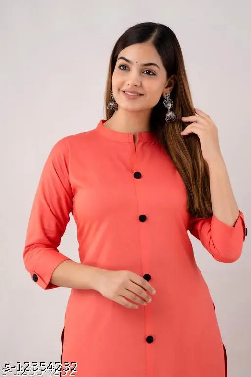 Embroidered rayon kurta set with embroidered pants, solid net design, perfect for festive casual wear or office events. Indian-made ethnic rayon dress for women