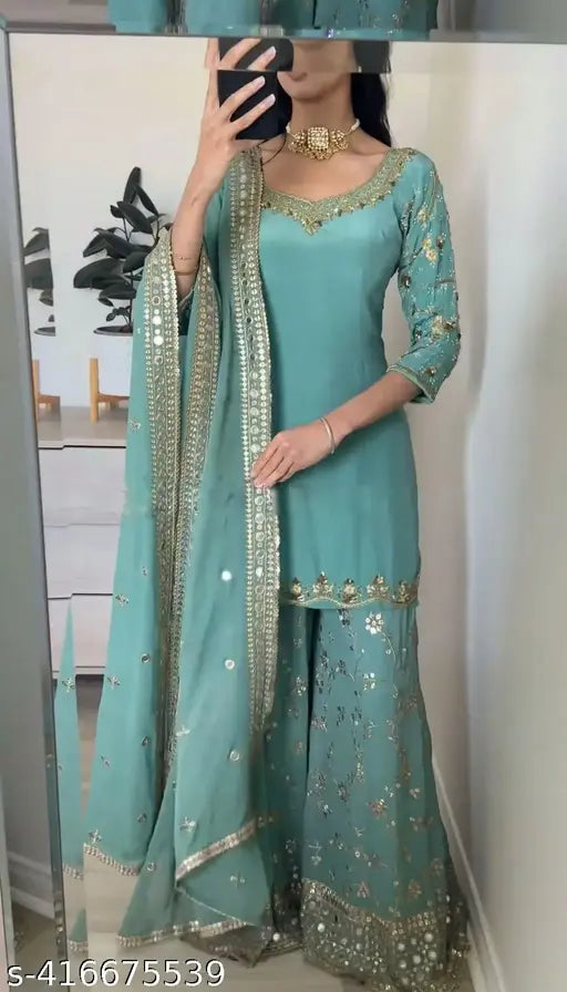 Georgette Trandy long kurti and sharara set with dupatta, three-quarter sleeves, single quantity, M-XXXL sizes available. Indian traditional women's outfit on display
