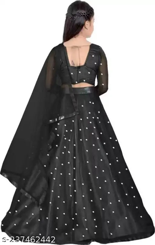 Kids acrylic lehenga choli set in polka dot pattern, net dupatta, three-quarter sleeves, ethnic wear for girls on display