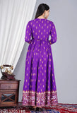 Vibrant purple viscose rayon long-tiered kurti with amb printed yoke and tassels, eye-catching women's garment on display