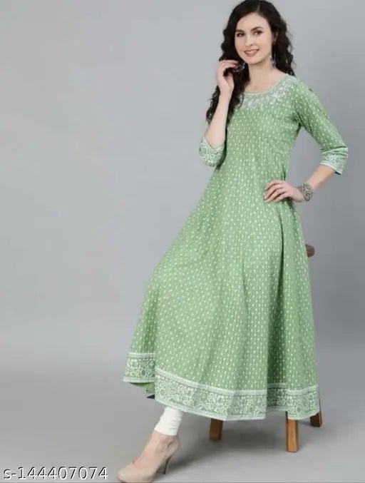 Green rayon three-quarter sleeve embroidered kurta with printed combo, traditional Indian clothing on model