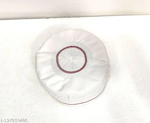 White embroidered cotton Islamic cap topi with cross-line design, authentic and comfortable for men's salat prayer. New 2024 design by Maolana Saad Saheb. Original condition, washable, and easy to maintain. Best quality and value on Gillkart. Measure head circumference before ordering for proper fit. Origin: India