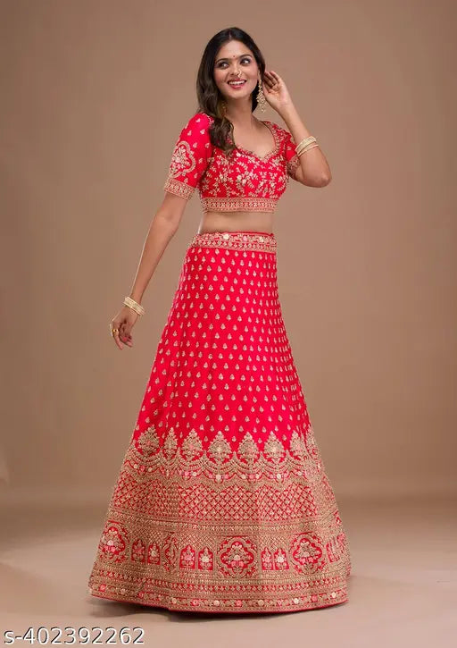 Tometo red satin lehenga choli with embroidered net dupatta - trendy heavy glamorous wedding wear for festive occasions