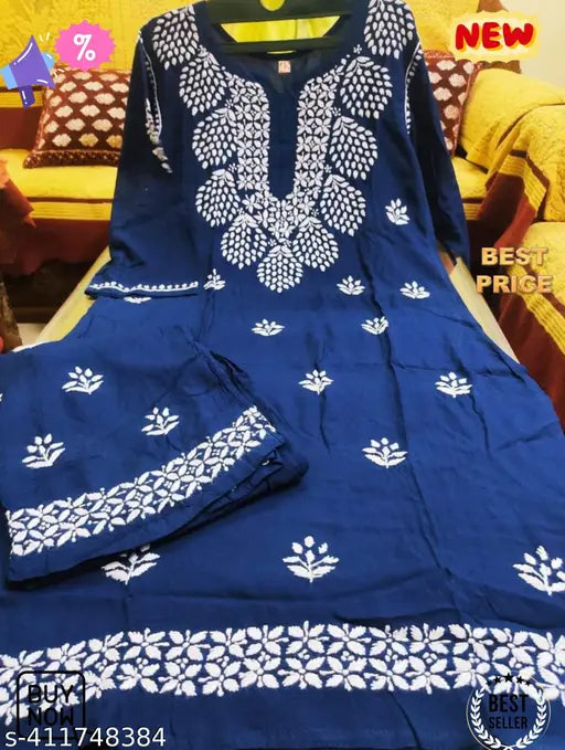 Embroidered rayon Chickankari kurta and palazzo set, three-quarter sleeves, Indian traditional embroidered clothing on display