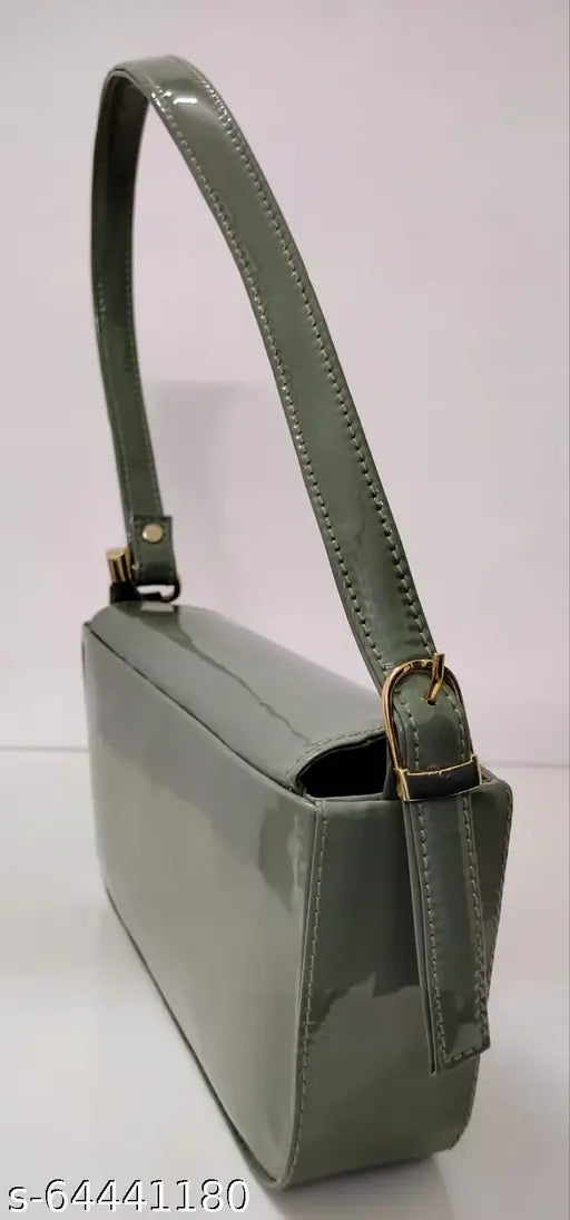 Green synthetic slingbag with box pattern, lightweight, short shoulder strap, smooth and silky touch - perfect for everyday essentials