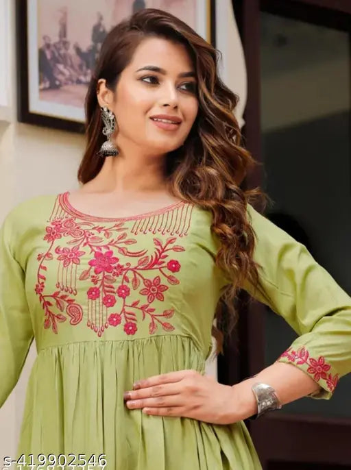 Green rayon embroidered gown with three-quarter sleeves, Indian fashion on mannequin