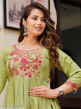 Green rayon embroidered gown with three-quarter sleeves, Indian fashion on mannequin