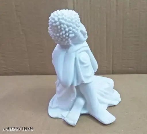 White poly-resin meditation Buddha statue, exquisitely crafted in Dhyana Mudra position for tranquil home or garden decor. Perfect gifting option for relatives, friends, and colleagues. Made in India