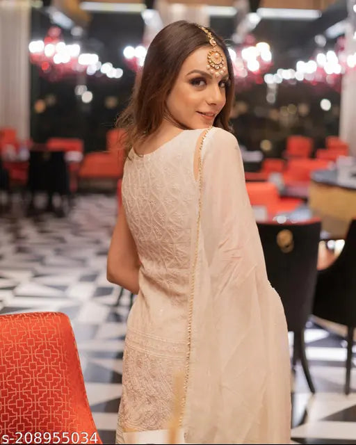 Embroidered cotton kurta sharara & dupatta - royal export women's comfortable festival wear, Indian embroidery design on display