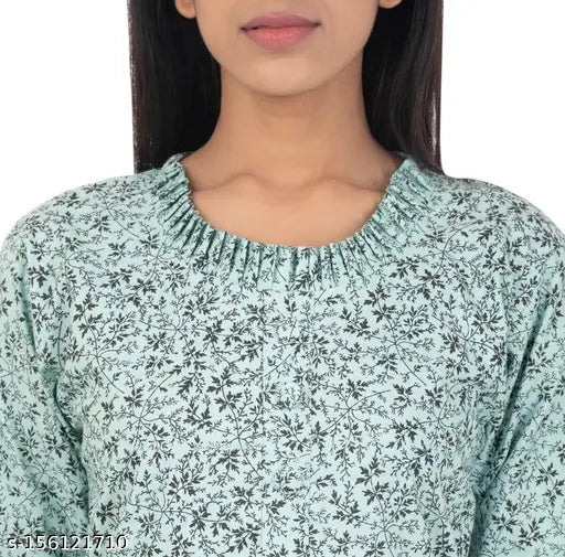 Stylish black printed green cotton kurti with three-quarter sleeves, single, available in XL, L, XXL, XXXL. Indian women's fashion wear