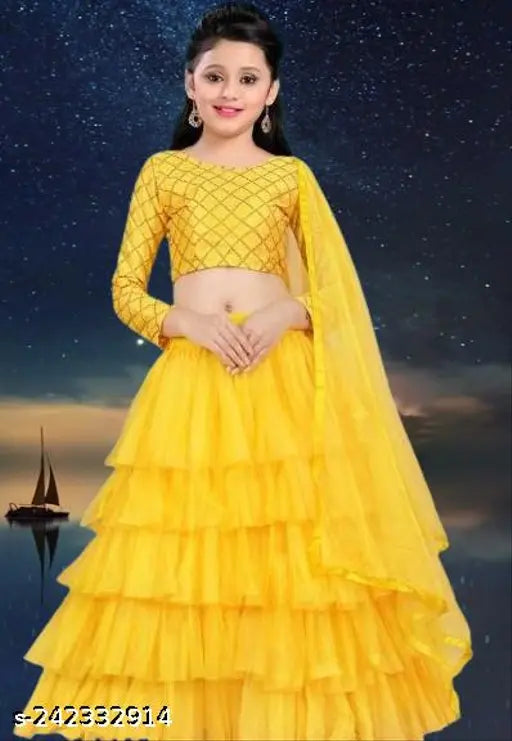 Yellow color Anokhi kids semi-stitched satin lehenga with ruffled stitch and net dupatta & sleeve, suitable for 15-16 years old
