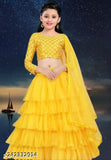 Yellow color Anokhi kids semi-stitched satin lehenga with ruffled stitch and net dupatta & sleeve, suitable for 15-16 years old