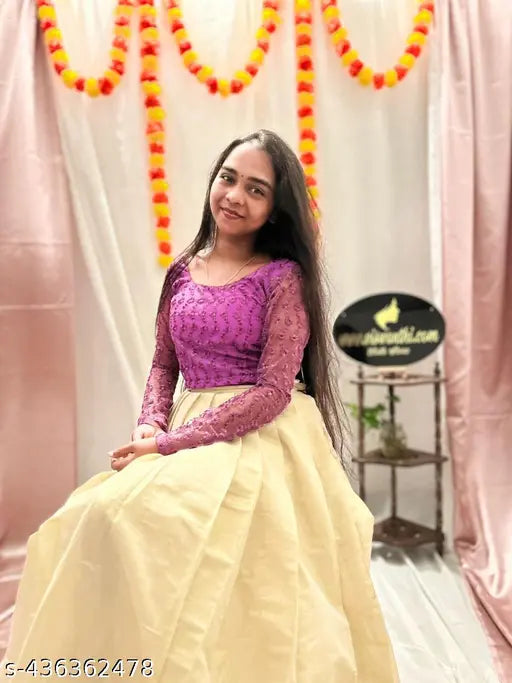 Pink net choli with silk skirt, PB126 designer Pattupavada set featuring embroidery sequence, full sleeves, and dori & fumaka detail. Made from net top and Kerala silk skirt with jari border, fully stitched and lined. Available in sizes S-XXXXL. Handcrafted in India, 350gm weight