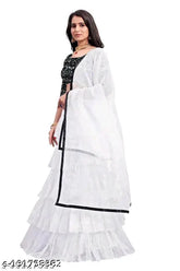Black & White embroidered lehenga choli set with dupatta for women, featuring net fabric and free size. Indian-made quality lehenga choli and dupatta on display stand