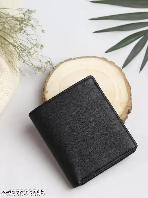 Black faux leather men's wallet, durably lined with 7 card slots, 2 secret slots, and 2 compartments made in India