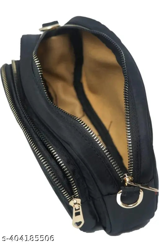 Black canvas & leather sling bag with one compartment and one pocket, perfect for traveling and organizing makeup. Free size (10x8x4 inches), holds 1 liter, measures 150mm in depth, and weighs 400g. Exclusive latest design by DENLLY