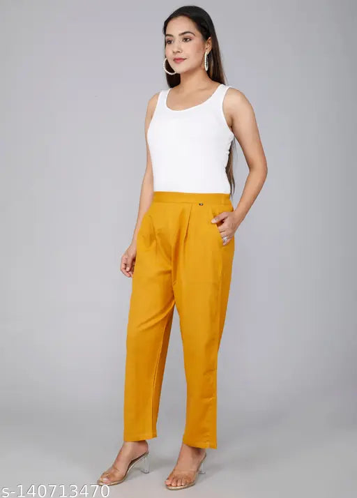 Gold cotton casual trousers by Rakshita Fashions, ankle length with pleats, front pockets, elasticated back, versatile for daily wear or travel