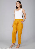 Gold cotton casual trousers by Rakshita Fashions, ankle length with pleats, front pockets, elasticated back, versatile for daily wear or travel