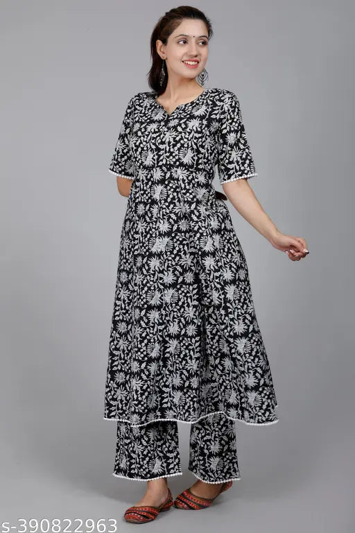 Black rayon palazzo set with three-quarter sleeves, printed net pattern. Pack of 2 sizes: M, L, XL, XXL. Ethnic Indian wear for contemporary casual style