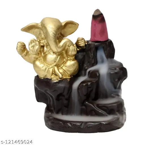 Handcrafted Poly Resin Ganesh Idol with Anti-Smoke Backflow, creates a smokey waterfall illusion. Includes 10 smoke cones. Indian artistry