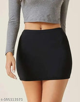 Trendy black cotton blend mini skirt for women, solid net pattern, size 26/28/30 inches waist and length, India-made fashion accessory