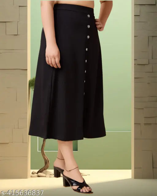 Black imported cotton blend midi length women's skirt, solid pattern for fashionable attire on model