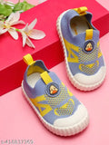 Sky Blue & Yellow cotton slip-on shoes for toddler boys, featuring PVC sole and EVA insole for comfort during first steps. Cartoon character pattern adds style to early adventures