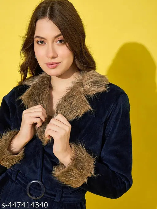 Navy velvet winter coat with soft fur lining, featuring a flattering belted waist and two spacious pockets. Women's jacket in solid color, designed for both casual and formal occasions