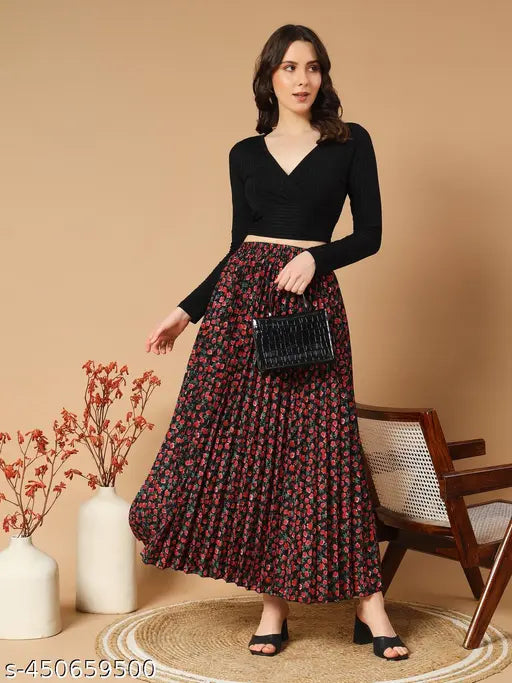 Floral pleated rayon maxi skirt for women, elastic waist, fashionable western design. Black hue with printed net pattern, convenient pockets. Perfect fit for sizes 26-38 inches waist, 42-48 inches hip. Made in India