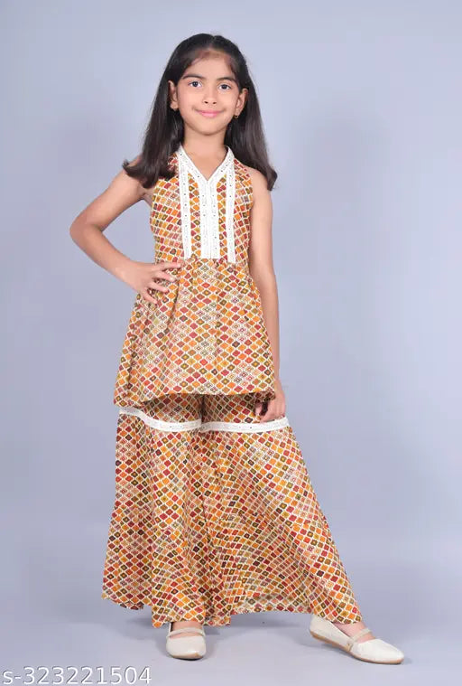 Rayon printed kurta and sharara set for girls, vibrant Indian festive wear in A-line top with short sleeves