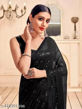 Teal blue net embroidered sequence work saree with unstitched dupion silk blouse piece, crafted by skilled artisans in India