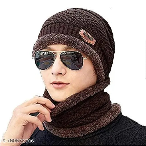Black woolen beanie hat, scarf, and gloves set for men & women. Thick acrylic knit construction with fur lining for added warmth. Perfect for various winter activities