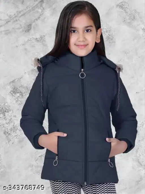 Nylon winter jacket, solid pattern for girls aged 7-12 years. Warm, comfortable, and easy to wear in vibrant colors. Made in India